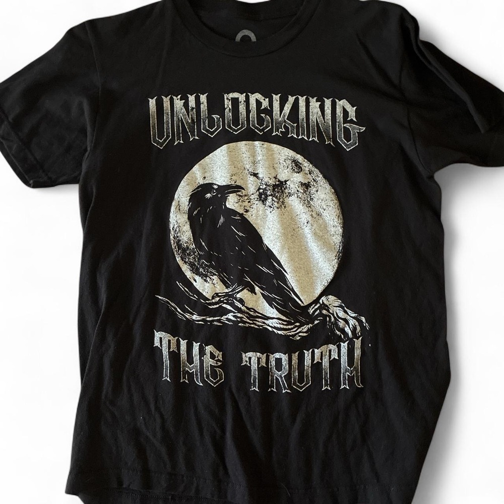 Brand new without tags. Men's size medium (fits small) graphic Tshirt